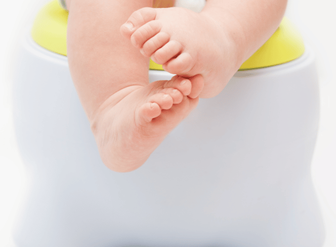 Babies feet on potty