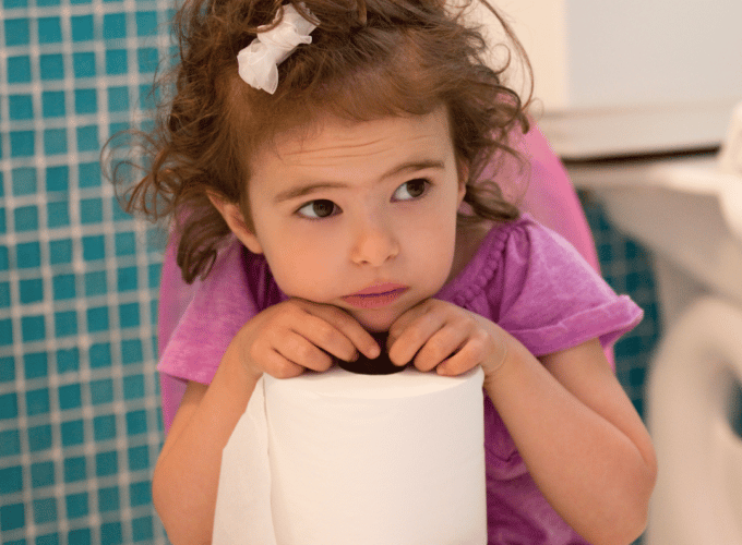 Girl holding toilet roll