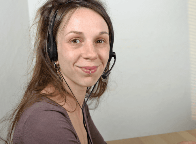 Women wearing telephone headset