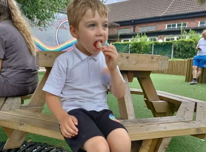 Boy Vlad sitting on a bench