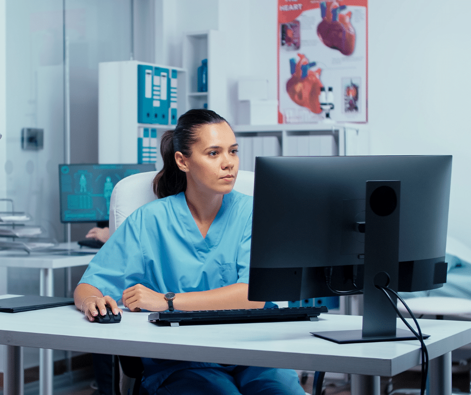 woman looking at computer screen