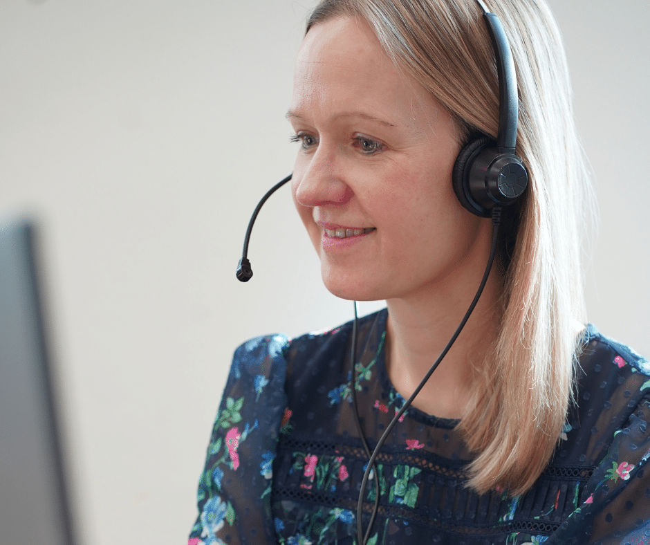 A helpline advisor taking a call