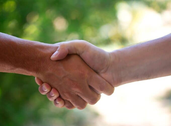 Hands clasping